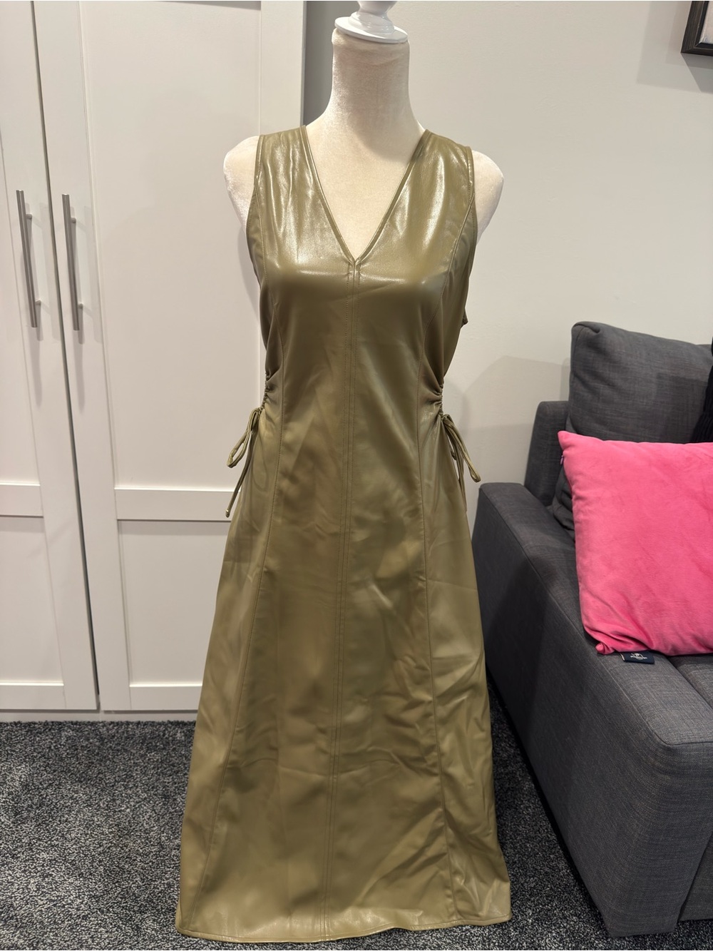 The Drop Sleeveless V-Neck Faux Leather Midi Dress in Olive